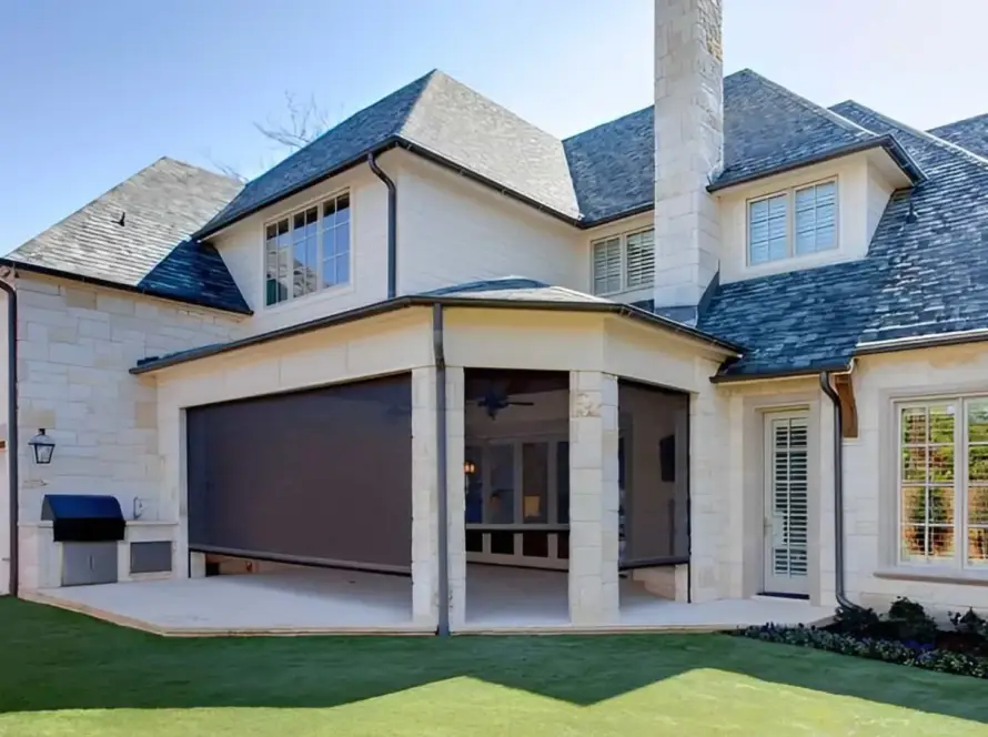 Etobicoke home with a sleek motorized retractable patio screen.
